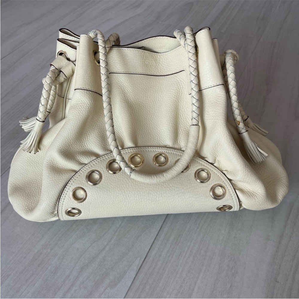 Anya Hindmarch cream leather purse with tásale tie!